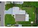 Aerial view of property showing the house, driveway, and backyard at 2522 W North St, Tampa, FL 33614