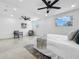 Spacious bedroom featuring ceiling fan and a grey rug at 2522 W North St, Tampa, FL 33614