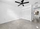 Bedroom featuring a bi-fold door closet and sleek flooring at 2522 W North St, Tampa, FL 33614