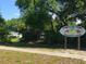 Sign for Pinellas Park Equestrian Center, surrounded by lush greenery and trees at 3600 105Th N Ave, Clearwater, FL 33762