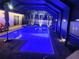 Tranquil pool and spa area illuminated with ambient lighting for evening enjoyment at 3600 105Th N Ave, Clearwater, FL 33762