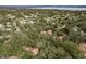 A serene aerial perspective of homes surrounded by lush trees, offering privacy and natural beauty at 515 Mistletoe Ct # C, Safety Harbor, FL 34695