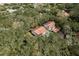 An aerial shot showing homes nestled amongst mature trees in a peaceful residential neighborhood at 515 Mistletoe Ct # C, Safety Harbor, FL 34695