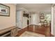 Inviting living room with wood floors and neutral decor, perfect for entertaining guests and Gathering gatherings at 515 Mistletoe Ct # C, Safety Harbor, FL 34695