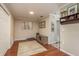 Spacious living room with neutral colors, wood floors, and natural lighting at 515 Mistletoe Ct # C, Safety Harbor, FL 34695