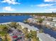 Picturesque aerial view of waterfront condos with private docks on a tranquil canal at 5152 Salmon Se Dr # C, St Petersburg, FL 33705