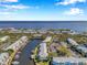 Stunning aerial view of waterfront community, showcasing the beautiful canal and coastal living at 5152 Salmon Se Dr # C, St Petersburg, FL 33705