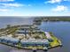 Breathtaking aerial view of waterfront condominiums offering serene water views and boat docks at 5152 Salmon Se Dr # C, St Petersburg, FL 33705