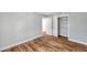 Bright bedroom with sleek floors, closet, and easy access to other rooms at 5152 Salmon Se Dr # C, St Petersburg, FL 33705