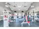 Large, modern gym with various weight machines, treadmills, and ceiling fans at 5152 Salmon Se Dr # C, St Petersburg, FL 33705