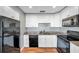 Well-lit kitchen with stainless steel appliances and granite countertops at 5152 Salmon Se Dr # C, St Petersburg, FL 33705