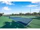 Enjoy a match on the community's well-maintained tennis courts under a sunny sky at 5152 Salmon Se Dr # C, St Petersburg, FL 33705