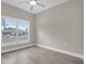 Bedroom with a large window looking out to the neighborhood at 5341 71St N Way, St Petersburg, FL 33709