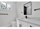 Modern bathroom with marble countertop and black fixtures at 5351 71St N Way, St Petersburg, FL 33709