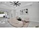 Bright and airy living room with neutral furniture and modern art at 5351 71St N Way, St Petersburg, FL 33709