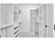 Spacious walk-in closet with custom shelving and ample storage space at 5351 71St N Way, St Petersburg, FL 33709