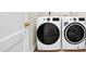 Modern laundry room boasts new, matching washer and dryer units at 5361 71St N Way, St Petersburg, FL 33709