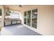 The covered patio features a built-in outdoor kitchen and sliding glass doors at 5361 71St N Way, St Petersburg, FL 33709