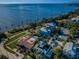 An aerial view of a neighborhood near a body of water at 614 Maryland Ave, Crystal Beach, FL 34681