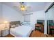 Well-lit bedroom featuring a large closet and quaint furniture at 614 Maryland Ave, Crystal Beach, FL 34681