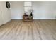 Cozy living room with a wooden table, books, and a lamp at 614 Maryland Ave, Crystal Beach, FL 34681