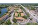 Aerial view of the condo community with a pool and easy access to a major thoroughfare at 6328 Newtown Cir # 28A1, Tampa, FL 33615