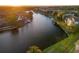 An aerial view of a community on a winding canal during sunset at 6328 Newtown Cir # 28A1, Tampa, FL 33615