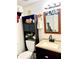 Bathroom features a vanity with solid surface countertop and a toilet with storage at 6328 Newtown Cir # 28A1, Tampa, FL 33615