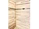 Shower features earth-toned tiling and a pebble floor at 6328 Newtown Cir # 28A1, Tampa, FL 33615