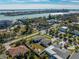 Aerial view of a beautiful neighborhood showing mature trees and well-maintained homes at 66 Kipling Plz, Clearwater Beach, FL 33767