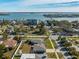 Birds-eye view of a quiet neighborhood, with mature landscaping, close to the bay at 66 Kipling Plz, Clearwater Beach, FL 33767