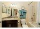 Well-maintained bathroom with granite countertop vanity and shower/tub combo at 707 Highland N St, St Petersburg, FL 33701