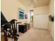 Carpeted bedroom featuring a closet, a ceiling fan, and natural light at 707 Highland N St, St Petersburg, FL 33701