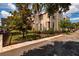 Well-maintained townhome exterior with landscaping and a private walkway at 707 Highland N St, St Petersburg, FL 33701