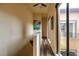 Hallway with hardwood floors, large windows, natural light, and a ceiling fan at 707 Highland N St, St Petersburg, FL 33701