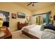 Main bedroom featuring a ceiling fan, and patio access at 707 Highland N St, St Petersburg, FL 33701