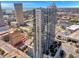 Stunning aerial view of a modern high-rise condo building with city and water views at 777 N Ashley Dr # 1505, Tampa, FL 33602