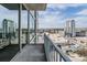 City view from balcony with concrete floors, metal railings and a view of city buildings at 777 N Ashley Dr # 1505, Tampa, FL 33602