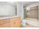 Bathroom featuring wood vanity with a large shower and a tiled tub at 777 N Ashley Dr # 1505, Tampa, FL 33602