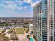 A clear city view featuring a waterfront park, buildings, and modern architecture at 777 N Ashley Dr # 1505, Tampa, FL 33602