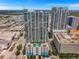 An aerial view of the building, including a rooftop pool and surrounding city landscape at 777 N Ashley Dr # 1505, Tampa, FL 33602