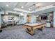 Inviting game room featuring a pool table, comfortable seating, and modern decor at 777 N Ashley Dr # 1505, Tampa, FL 33602