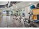 Fully equipped gym with mirror walls, rubber flooring, and city views at 777 N Ashley Dr # 1505, Tampa, FL 33602