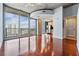 Bright living area with hardwood floors, city views, and a modern, open-concept kitchen at 777 N Ashley Dr # 1505, Tampa, FL 33602