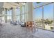 Stylish lounge featuring floor-to-ceiling windows offering a unique view of the city skyline at 777 N Ashley Dr # 1505, Tampa, FL 33602