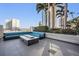 Stunning rooftop patio featuring comfortable seating, modern fire pit, and views of city skyline at 777 N Ashley Dr # 1505, Tampa, FL 33602