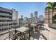 Rooftop terrace with outdoor seating and stunning city views at 777 N Ashley Dr # 1505, Tampa, FL 33602