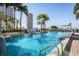 Stunning rooftop pool with city skyline views and lounge chairs at 777 N Ashley Dr # 1505, Tampa, FL 33602