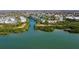 Water view of condos on canal surrounded by mangroves with beautiful bay and city views at 9920 Indian Key Trl # 29, Seminole, FL 33776