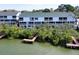 Waterfront condos with docks and lush green surroundings at 9920 Indian Key Trl # 29, Seminole, FL 33776